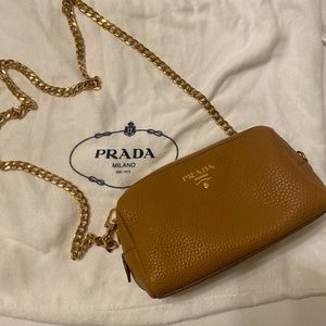 Prada grained color tan leather clutch